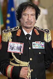 М.Каддафи