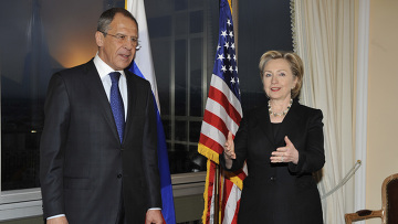 Сергей Лавров и Хиллари Клинтон на встрече в Женеве 6.03.09. Фото с сайта РИА Новости